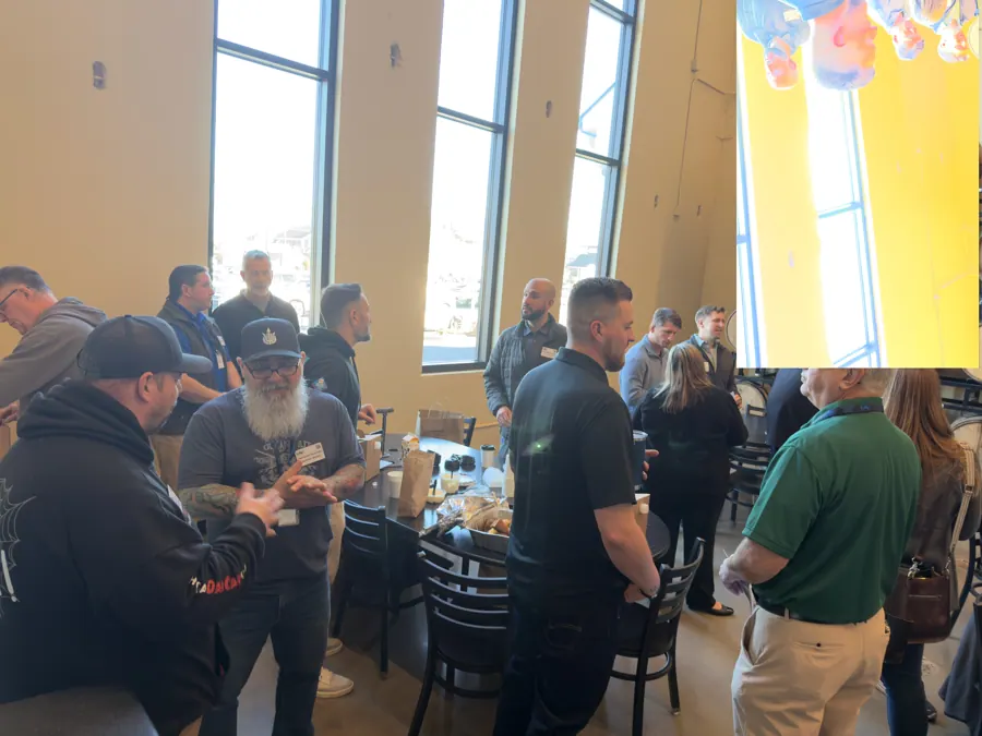 Members networking before the meeting starts