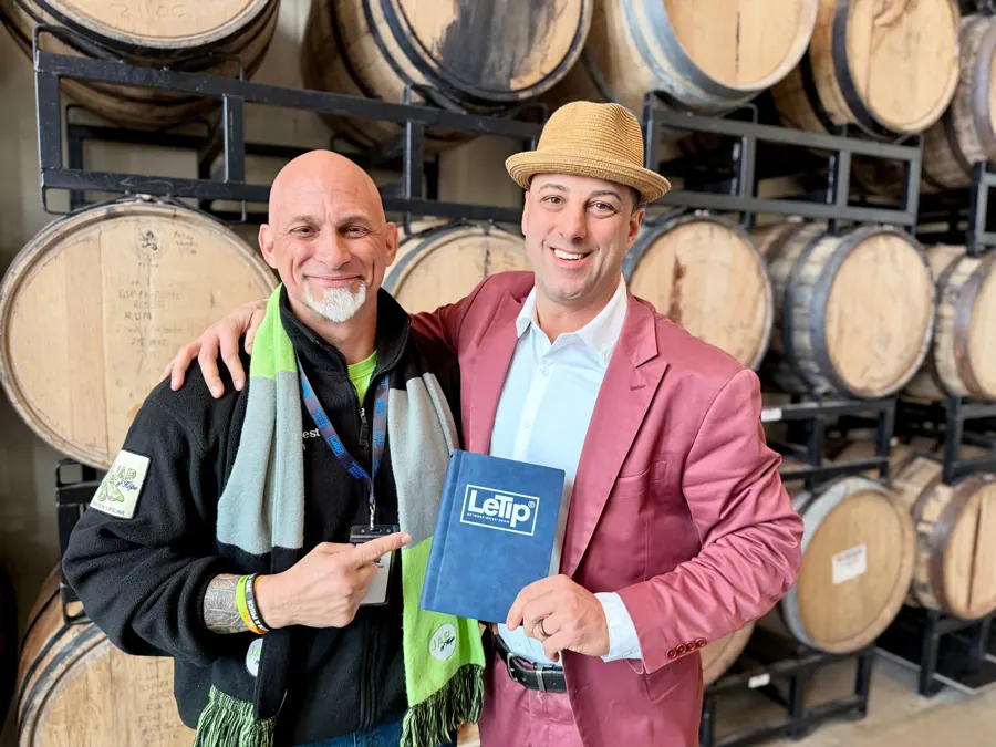 A new member welcomed with the LeTip member book